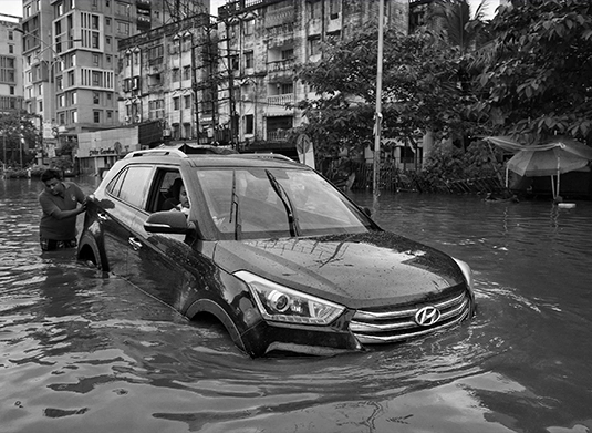 A-car-is-partially-submerged-in-floodwater